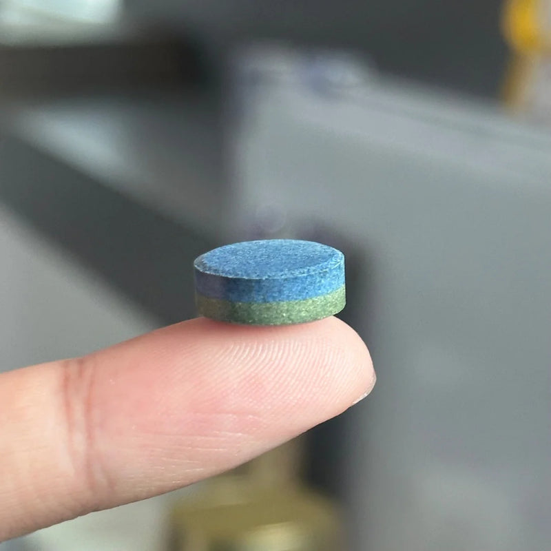 SpiroPlus chewable showing blue and green halves
